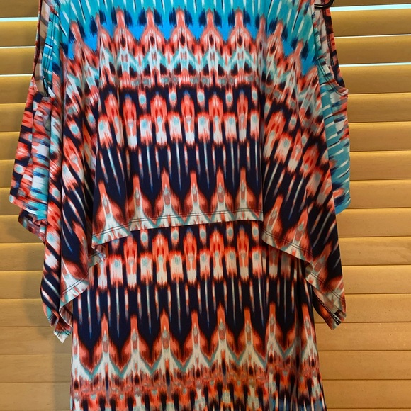 Multi colored top. 95% polyester and 5% spandex - Picture 3 of 3